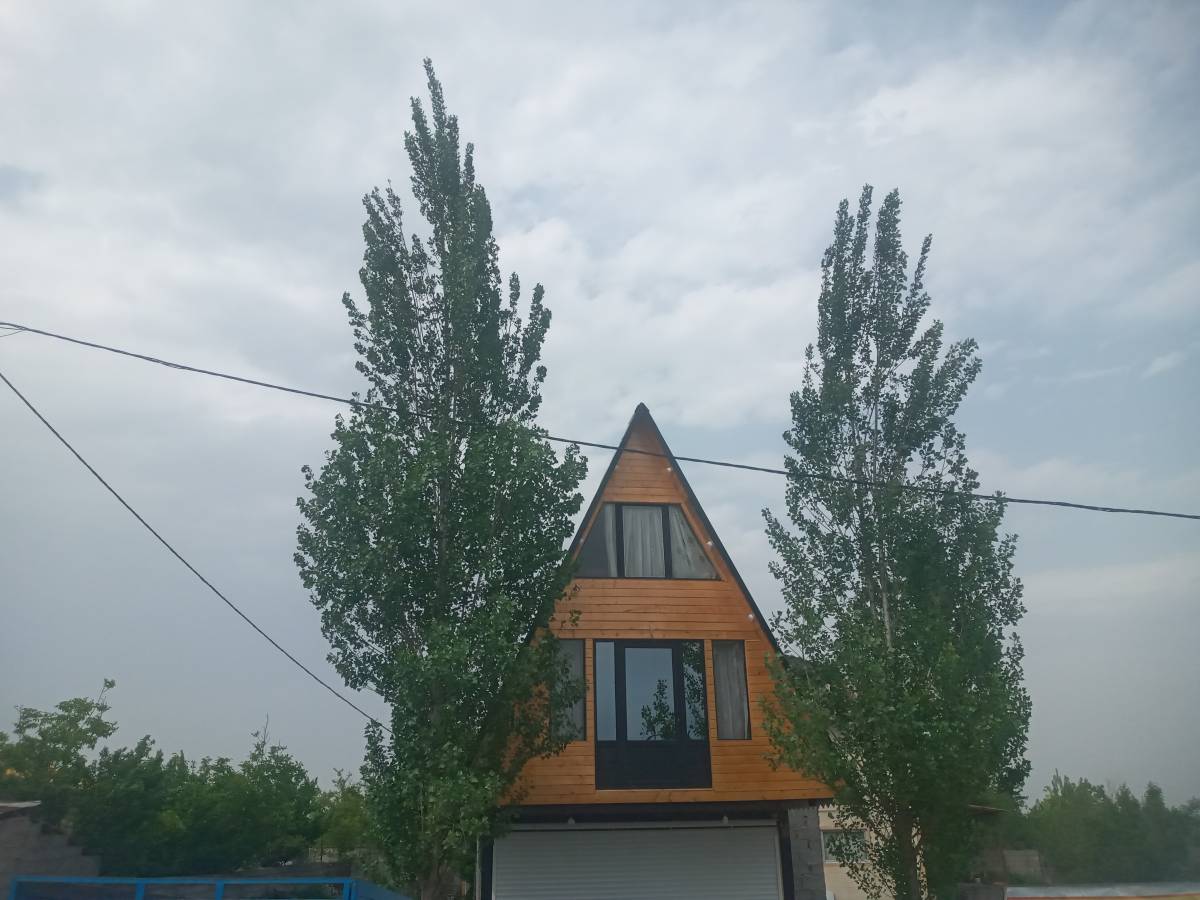 کلبه چوبی باران (رشت)