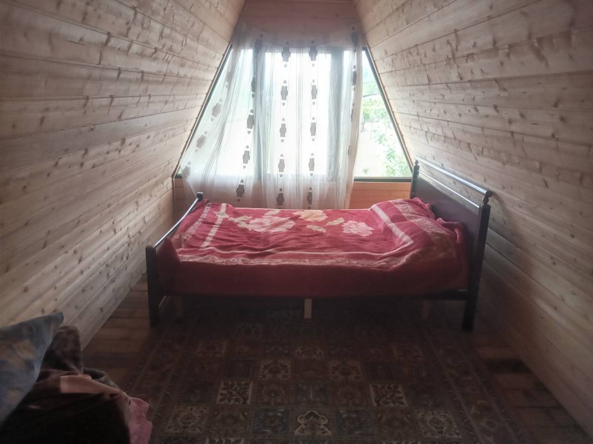 کلبه چوبی باران (رشت)